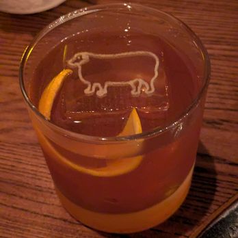 The Fat Lamb - The Old Fashioned with a lamb logo on ice. - Cocktail Bars Near Me - Louisville, Kentucky