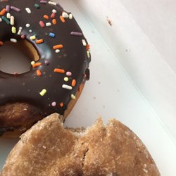 Dunkin' - Half-eaten donut.