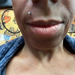 Arc Angel Tattoo & Piercing - Had the Marilyn Monroe mole piercing and I thought it was going to hurt, but it didn't and it was quick