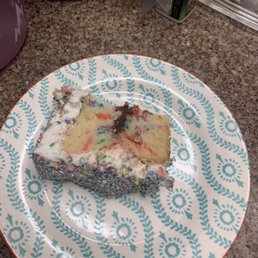 a slice of cake on a plate a slice of cake on a plate