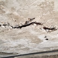 Mike's masonry - Before photo of ceiling coming loose.