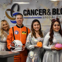 Merrill Shum, MD- Cancer and Blood Speciality Clinic - Flying to the moon with my team.  Happy Halloween!