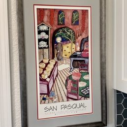 Framed poster in kitchen nook Framed poster in kitchen nook