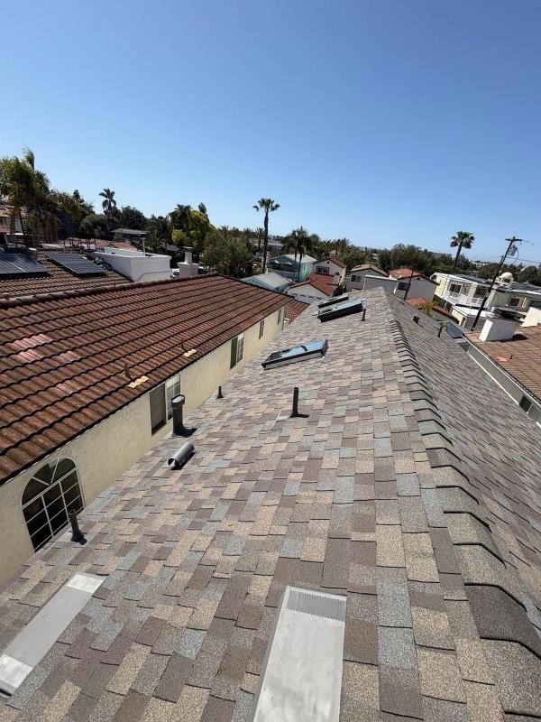 Slide of Vigil's Roofing