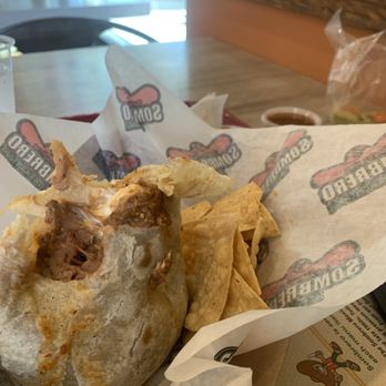 Sombrero Mexican Food - This is a mix beef , beans & cheese burrito with sour cream & their hottest salsa !! - Mexican Near Me - La Mesa, California Sombrero Mexican Food - This is a mix beef , beans & cheese burrito with sour cream & their hottest salsa !! - Mexican Near Me - La Mesa, California