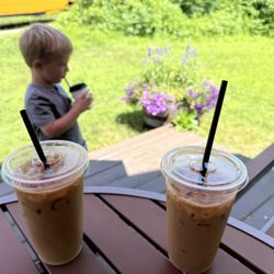 Elbow Room Coffee - Outside tables and flowers. Iced coffee.