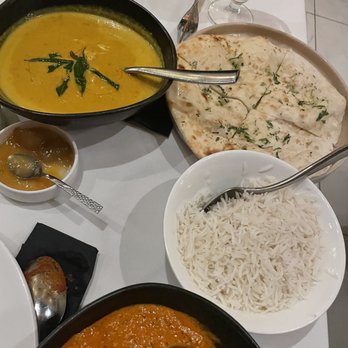 Commonwealth Indian Restaurant - Yellow crab curry, jasmine rice and garlic naan. All great! - Indian Near Me - Rockville, Maryland