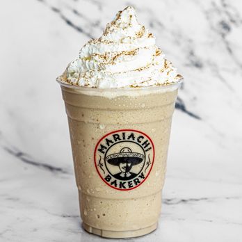 Mariachi Bakery - Horchata Frappe - Sweetened Horchata flavors, blended with our Espresso Roast, milk and ice, topped with whipped cream and sprinkled with ci - Coffee & Tea Near Me - Whittier, California Mariachi Bakery - Horchata Frappe - Sweetened Horchata flavors, blended with our Espresso Roast, milk and ice, topped with whipped cream and sprinkled with ci - Coffee & Tea Near Me - Whittier, California