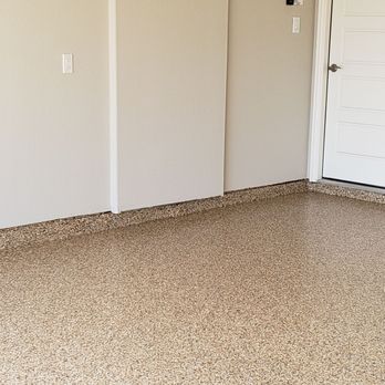 Diamond Cut Garage Floors - You would never know that a pipe had been exposed on that wall - Flooring Near Me