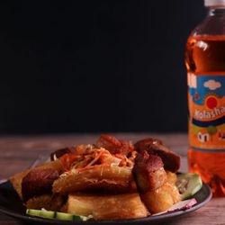 Pupuseria Los Farolitos - Yuca con chicharrón $10