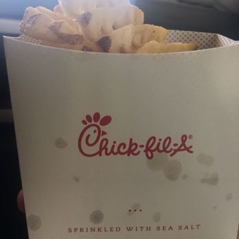 Chick-fil-A - ows a person holding a box of fried chicken - Fast Food Near Me - Spartanburg, South Carolina