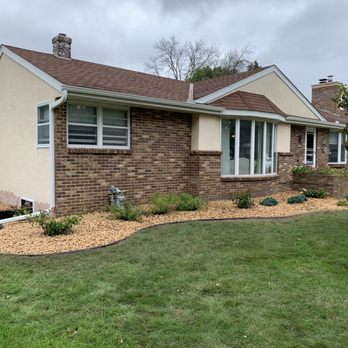 Northwood Outdoor Services - a home with a lawn and landscaping - Landscaping Near Me Northwood Outdoor Services - a home with a lawn and landscaping - Landscaping Near Me