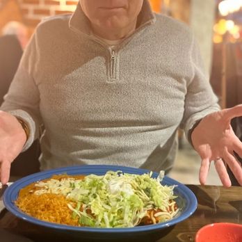 Hacienda Agave Mexican Grill - a man sitting at a table with a plate of food - Mexican Near Me - Champaign, Illinois