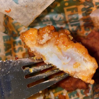 Wingstop - a piece of fried food with a fork - Chicken Wings Near Me - Lakewood, Colorado Wingstop - a piece of fried food with a fork - Chicken Wings Near Me - Lakewood, Colorado
