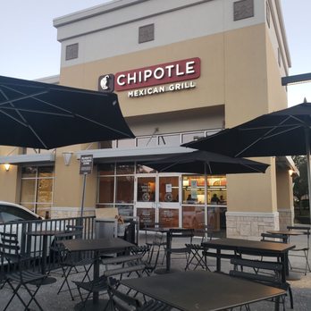 Chipotle Mexican Grill - tables and umbrellas - Mexican Near Me - Sanford, Florida Chipotle Mexican Grill - tables and umbrellas - Mexican Near Me - Sanford, Florida