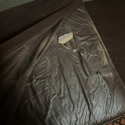 Days Inn & Suites by Wyndham Surprise - This is the other couch cushion also ripped with dirt coming out of it and visible on covering room #220.