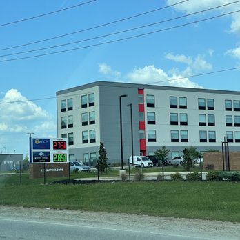 Twice Daily - a motel across the street from a parking lot - Coffee & Tea Near Me - Madison, Alabama Twice Daily - a motel across the street from a parking lot - Coffee & Tea Near Me - Madison, Alabama