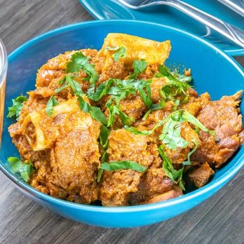 Indus Grill & Bar - a bowl of food and a glass of beer - Sports Bars Near Me - Vancouver, British Columbia Indus Grill & Bar - a bowl of food and a glass of beer - Sports Bars Near Me - Vancouver, British Columbia