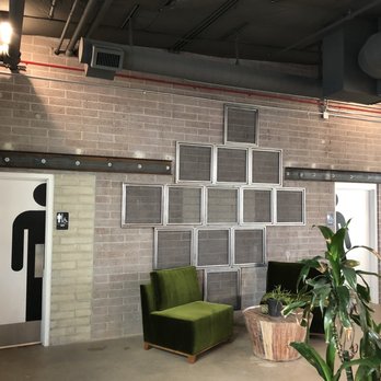 MoonGoat Coffee Roasters - Some cool artwork, bathrooms and sitting areas. - Coffee Roasteries Near Me - Costa Mesa, California