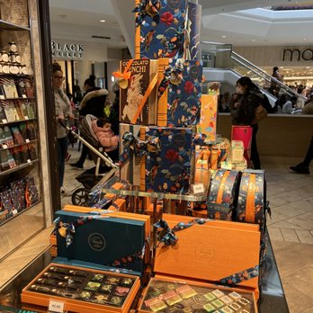 Venchi - a display of chocolates in a store - Chocolatiers & Shops Near Me - Millburn, New Jersey