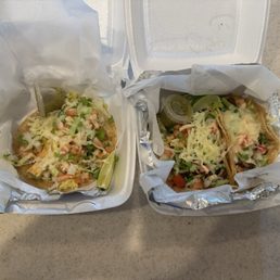 Chipotle pollo taco on the left and chorizo and pollo tacos on the right Chipotle pollo taco on the left and chorizo and pollo tacos on the right