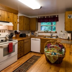 A Cozy River House - A Cozy River House riverfront cabins have full-sized kitchens, fully equipped with everything you need!  (Pic: Cozy 2 kitchen)