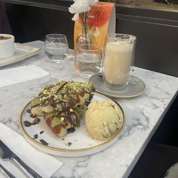 Heavenly Desserts - Pistachio and dark chocolate croffle with ice cream and spicy chai latte - Desserts Near Me - Mississauga, Ontario