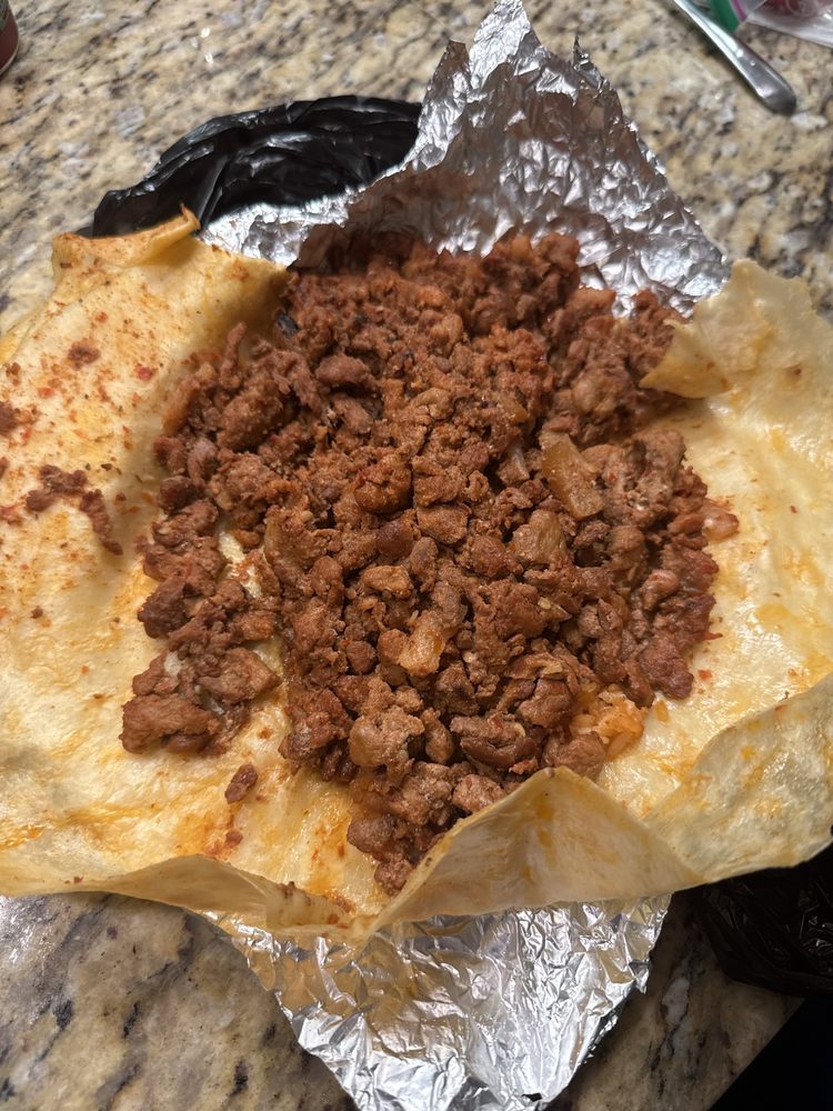 Tacos La Patrona Logo