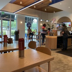 Bento Sushi - Front entrance. Clean tables and nicely lit area if you need to work remotely for a tiny bit while you eat.