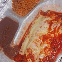 Beef Enchilada's, refried beans & rice. Beef Enchilada's, refried beans & rice.