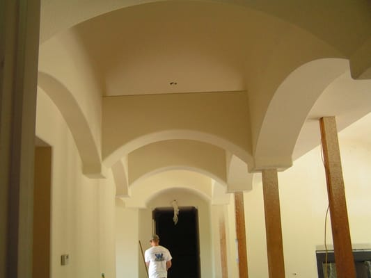 Frame and drywall Arches - This project was a very fun project. WE added arches and barrel ceilings all over the house.