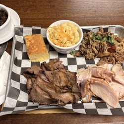 The Steel Plate - Burnt in on the side along with pulled pork, brisket and seasoned ham... Mac n cheese as the side along with a delicious cornbread