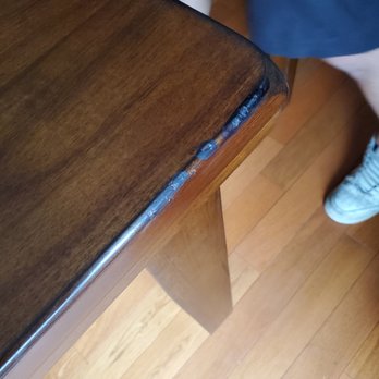 Ashley Store + Outlet - This is the delivery guys attempt to repair the scratches. - Furniture Stores Near Me - Mechanicsburg, Pennsylvania