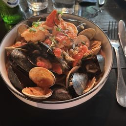 Homemade pasta with seafood. Plenty of seafood, perfectly cooked homemade pasta below.