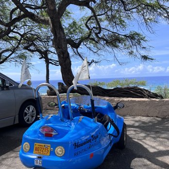 Hawaiian Style Rentals - Scoot coupe at the beach - Scooter Rentals Near Me - Honolulu, Hawaii