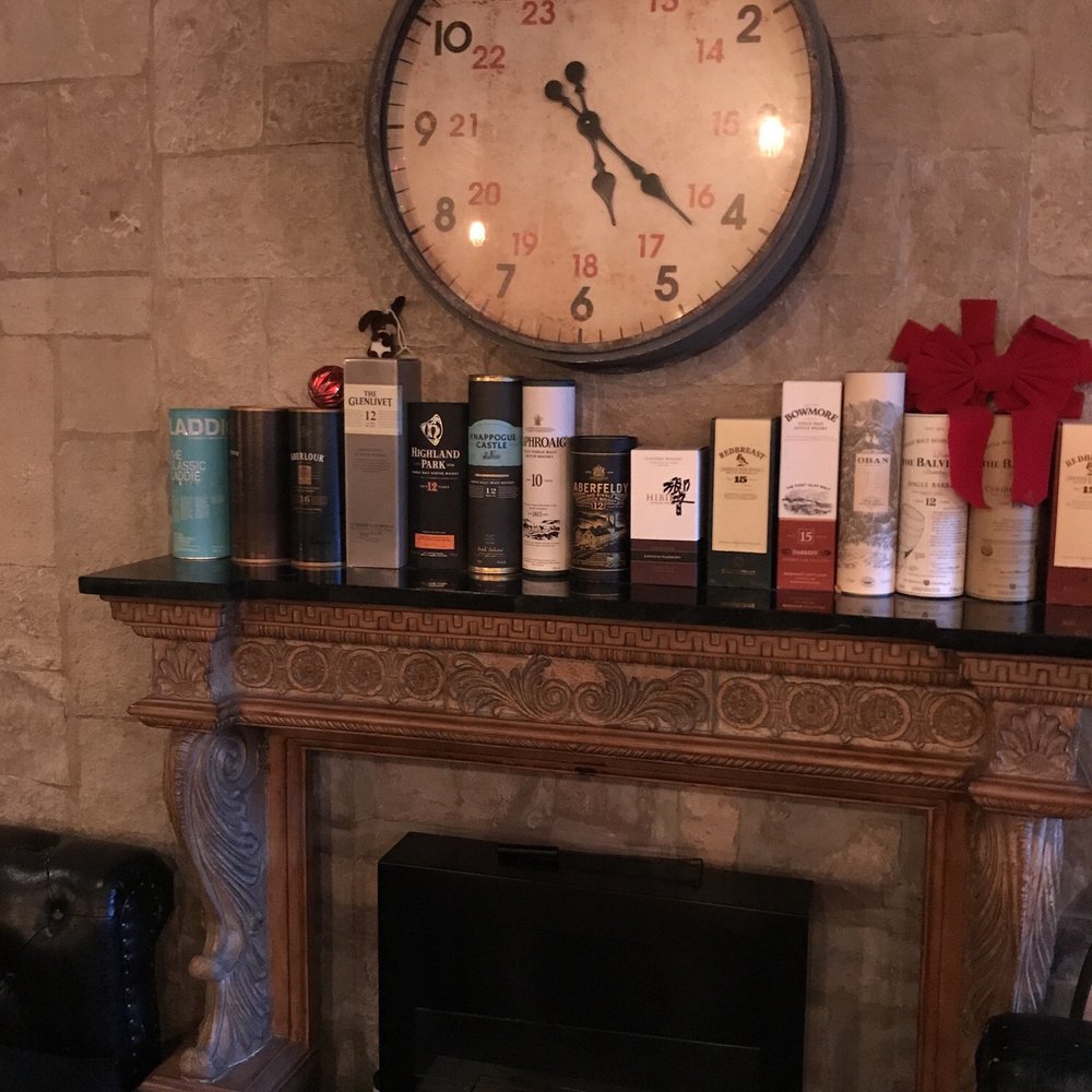 The Craic - a fireplace with candles and a clock - Pubs Near Me - Brooklyn, New York The Craic - a fireplace with candles and a clock - Pubs Near Me - Brooklyn, New York
