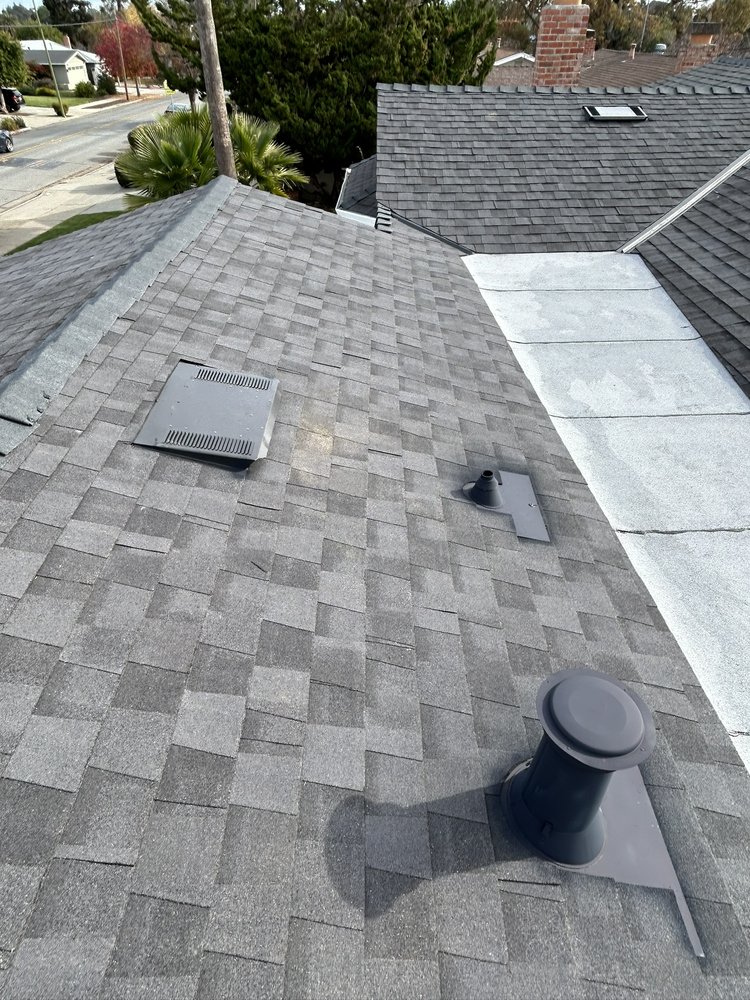 Slide of Tip Top Roofing
