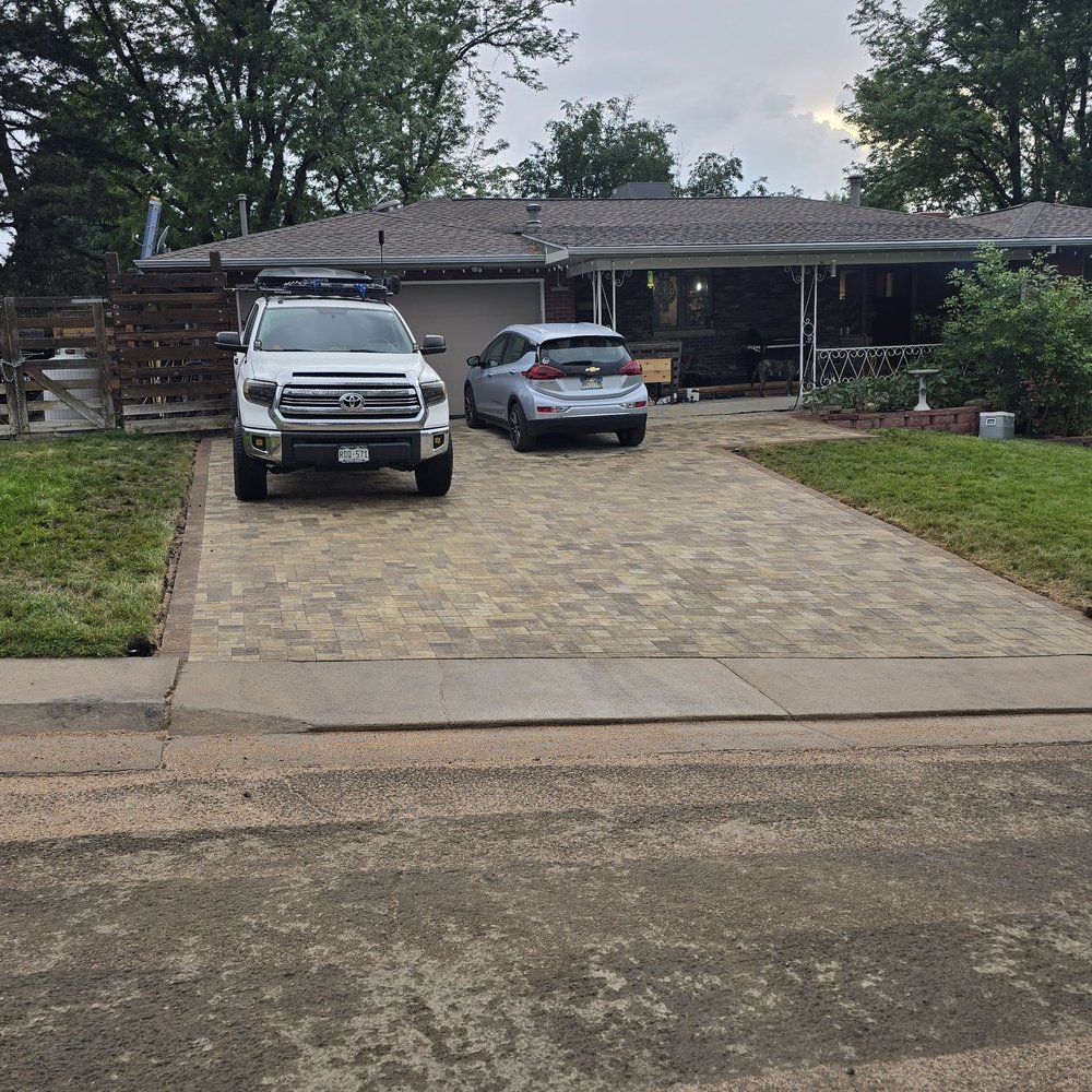 System Pavers - Brand new paver driveway, not to finish cleanup and install some new plant materials. - Masonry/Concrete Near Me - Denver, Colorado System Pavers - Brand new paver driveway, not to finish cleanup and install some new plant materials. - Masonry/Concrete Near Me - Denver, Colorado