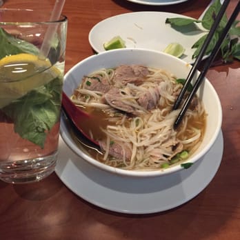 Pho 79 - My meal at Pho 79 and used mint leaves and lime with my water. - Vietnamese Near Me - Virginia Beach, Virginia