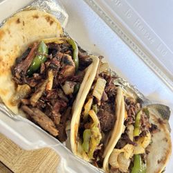 Both Worlds Twisted Potatoes & Company - Brisket tacos