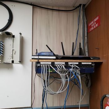 South King Technology Services - Before wall mounted rack for newly installed fiber run. - IT Services & Computer Repair Near Me - Auburn, Washington South King Technology Services - Before wall mounted rack for newly installed fiber run. - IT Services & Computer Repair Near Me - Auburn, Washington