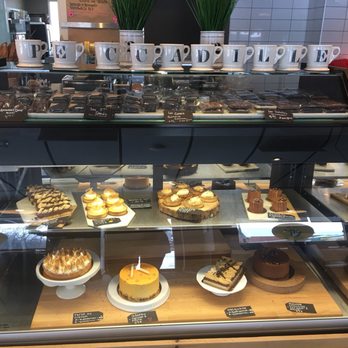 Peccadille - a variety of pastries in a display case - Chocolatiers & Shops Near Me - Longueuil, Quebec Peccadille - a variety of pastries in a display case - Chocolatiers & Shops Near Me - Longueuil, Quebec