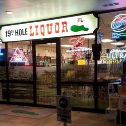 19th Hole Wine & Spirits - storefront, evening view