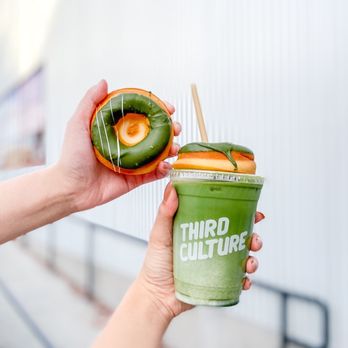 Third Culture Bakery - Berkeley - Matcha mochi donut (left) and matcha soy latte (right) - Bakeries Near Me - Berkeley, California
