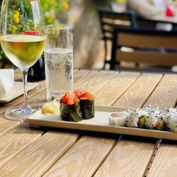 Punk Wok - The happy hour deal here is unbeatable! Spicy tuna, salmon roll half off! Wine $6