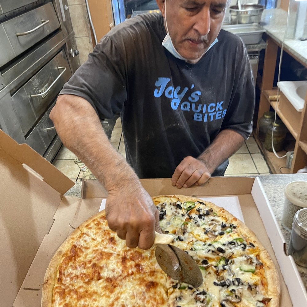 Jay's Quick Bites - THIS is what a pizza expert looks like! - Halal Near Me - Brooklyn, New York