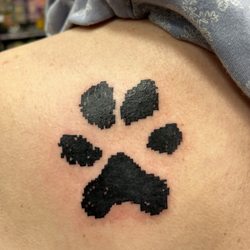 Designs by Dana - Dexter's paw print. Tattoo by Ryonen at Dana's