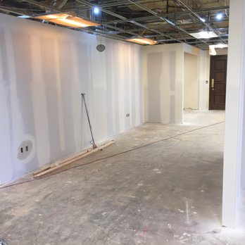 Spartans Contracting - the interior of a commercial building under construction - Drywall Installation & Repair Near Me
