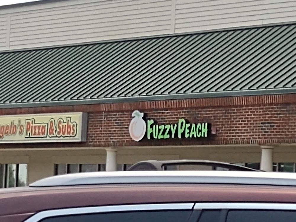 The Fuzzy Peach Frozen Yogurt Bar Logo