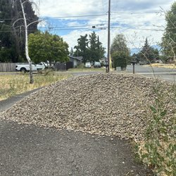 Hilton's landscape is horrible, their truck driver dumped his truck load of 3/4 round river rock on my driveway.